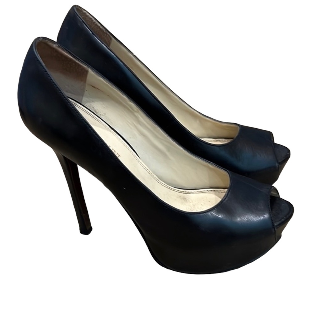 Enzo Angiolini, black leather platform, peep toes. Very comfortable.